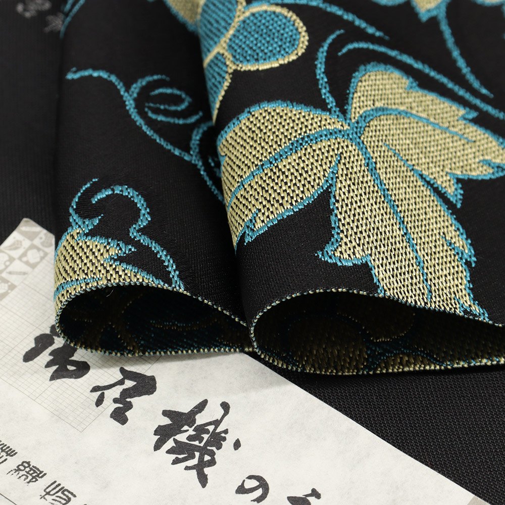 西陣御召地九寸名古屋帯(葡萄唐草)