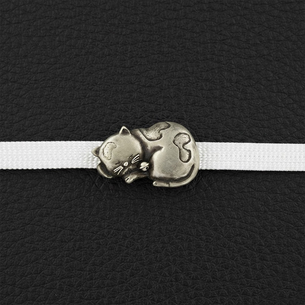 真鍮製帯留(眠り猫)【大原商店】